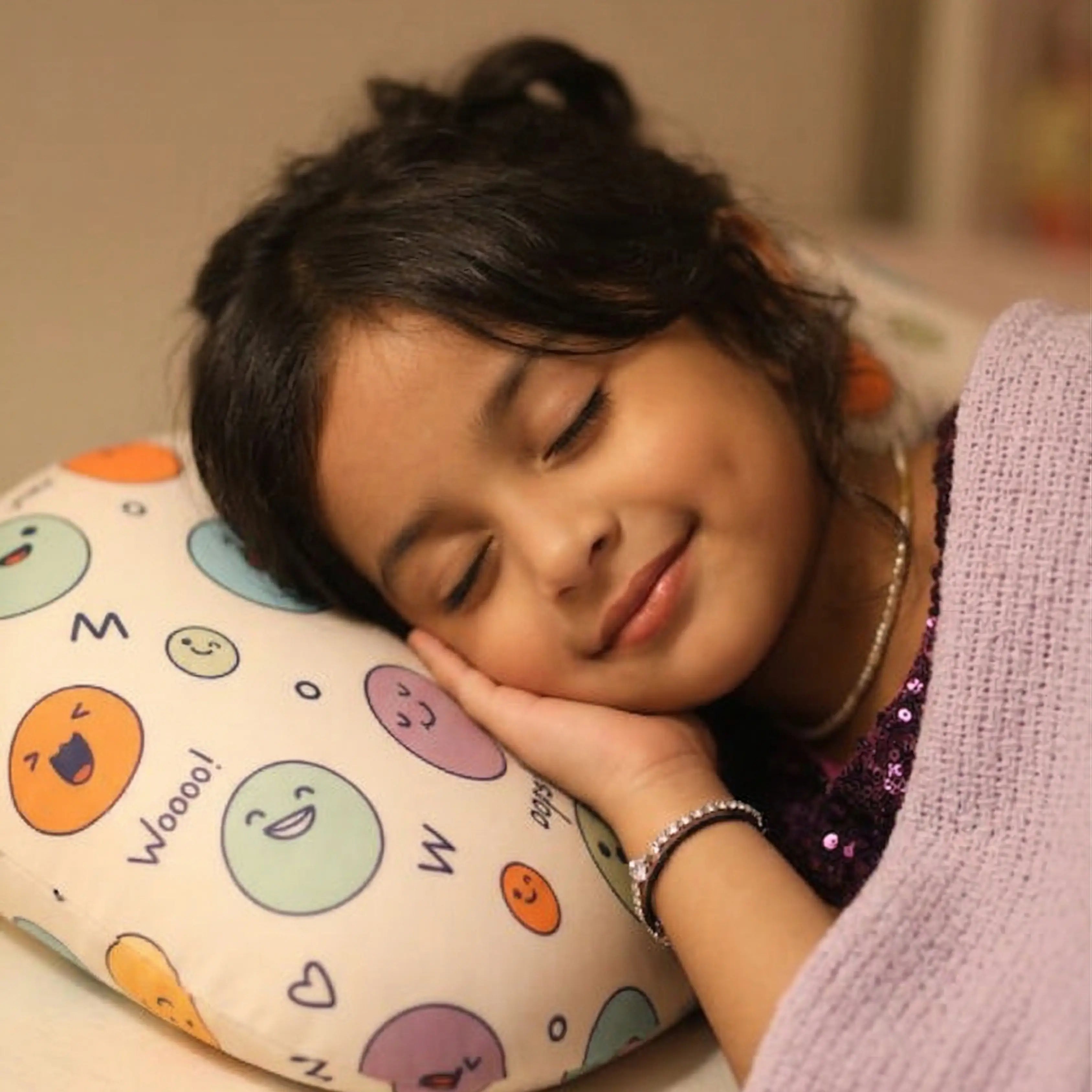 Child sleeping on a memory foam pillow